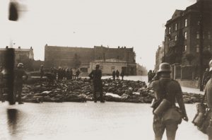 Hundreds of children and elderly Jews were killed by Nazi soldiers and collected in the public square in the Częstochowa ghetto in Nazi-occupied Poland, September 1939. More than 39,000 Jews were sent to the Treblinka extermination camp when the ghetto was liquidated in September 1942. Photo credit: USHMM #26829